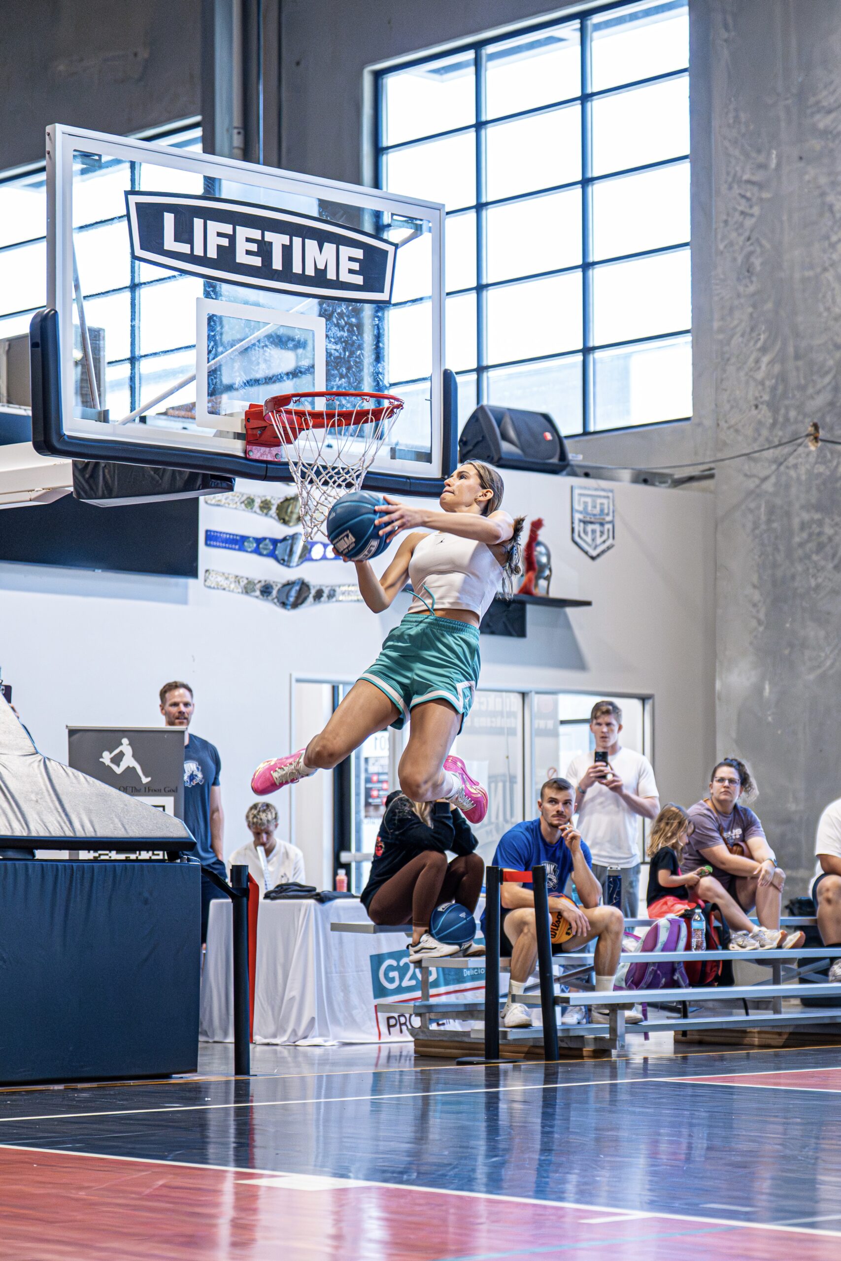 Brooke Lance dunking a basketball